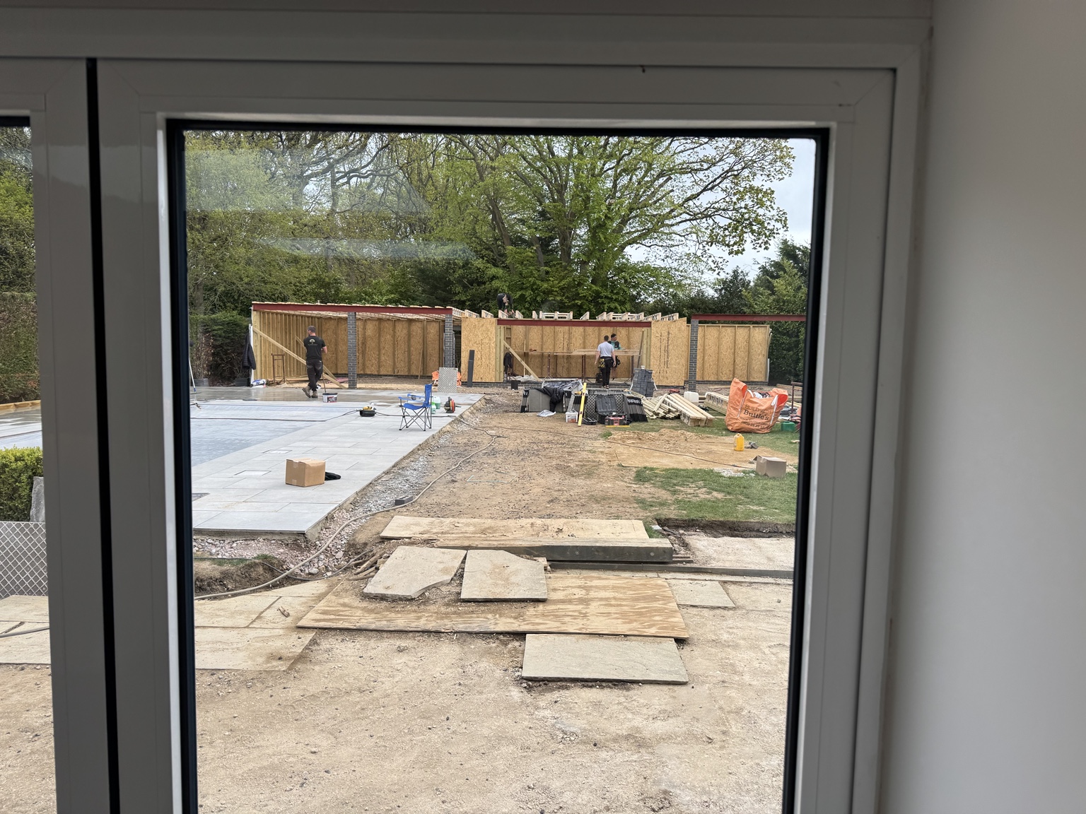 Patio slabs being laid during the garden project