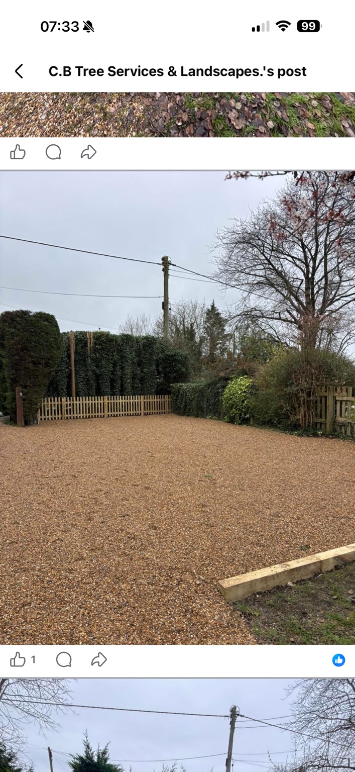 Completed gravel driveway extension and picket fence in Kensworth